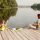 Family enjoying a multi-use floating dock on a Saskatchewan lake at sunset